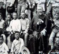 Padre Damián con leprosos